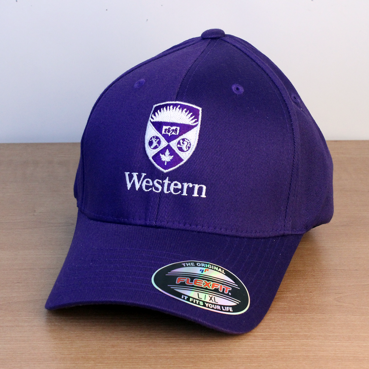 Purple ball cap with the Western crest embroidered on the front. L/XL sizing.
