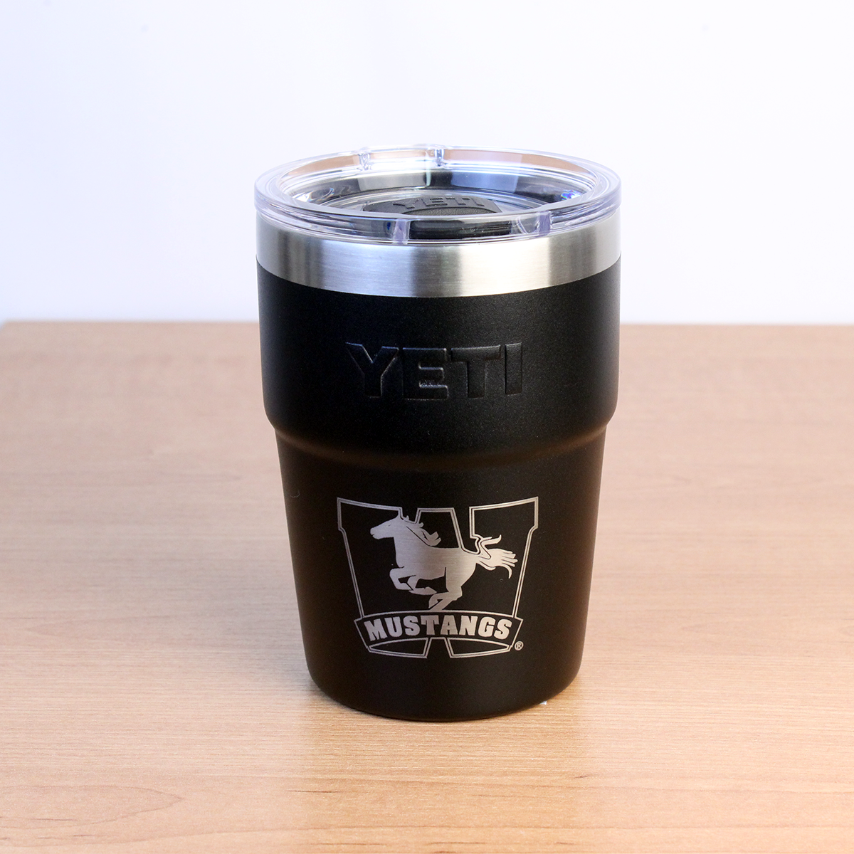 Black Yeti rambler with the Western Mustangs logo engraved on the front. Hold 473ml. Stackable style.