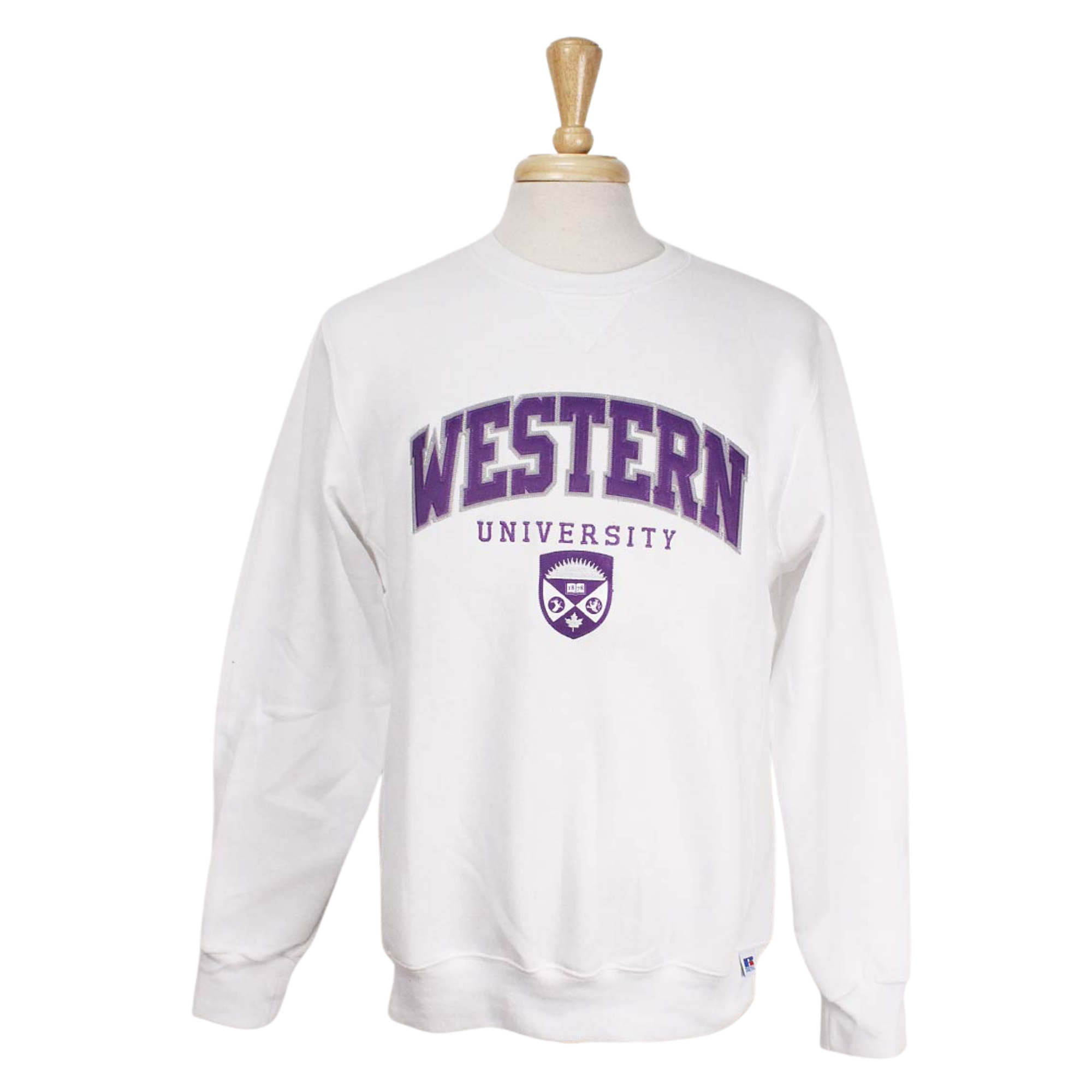 White crew neck. Appliqued 'Western' twill font in purple and grey.  Appliqued sublimated crest and 'University' embroidered in white and purple. 