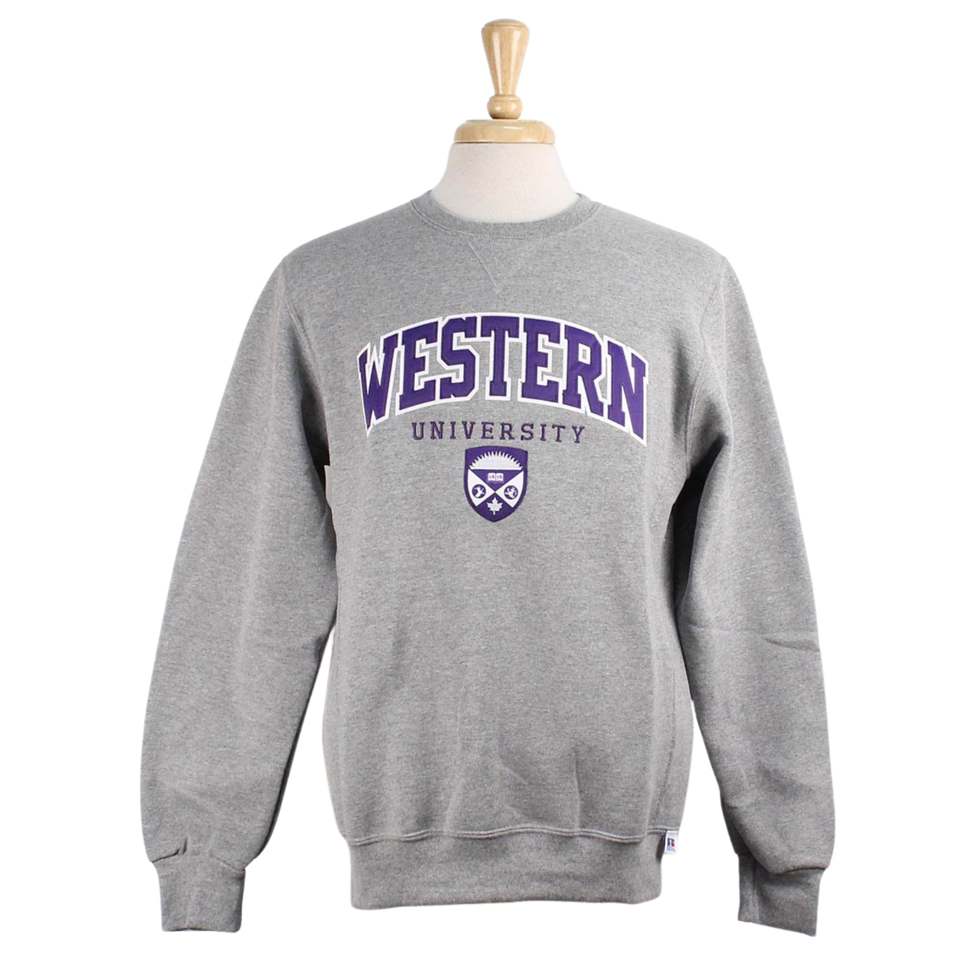 Grey Russell Athletic crew neck. Appliqued 'Western' twill font, sublimated crest and embroidered 'University' in white and purple. 