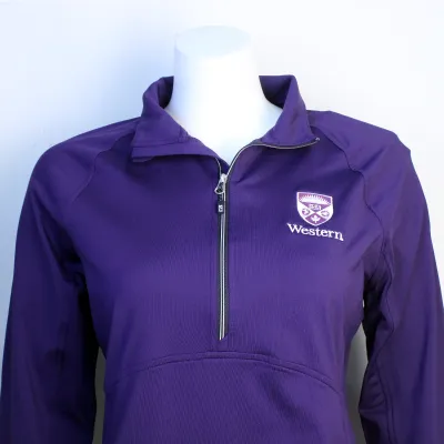 Purple quarter zip long sleeve with the Western Crest logo and script on the left chest.