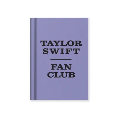 Purple notebook with black text 'Taylor swift fan club'