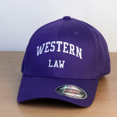 Purple ball cap with Western Law embroidered on the front. L/XL sizing.