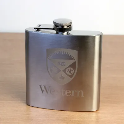 Flask with the Western Crest logo engraved on the front.
