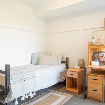 View of a residence room and desk.