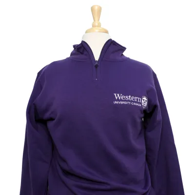 Purple 1/4 zip with "Western University" and Crest logo embroidered on the left chest.