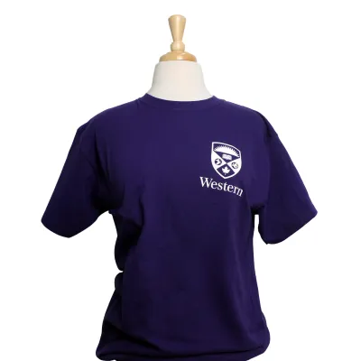 Purple tee with Western Crest logo printed on the left chest and "All In." script graphic on the back. 