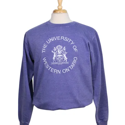 Lavender crew neck with "The University of Western Ontario" script circling the vintage coat of arms embroidered on the front.