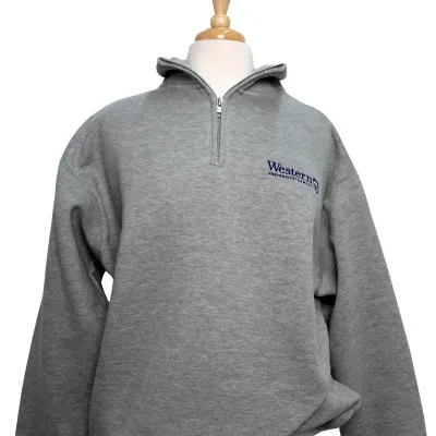 Heather grey 1/4 zip with "Western University" and Crest logo embroidered on the left chest. 