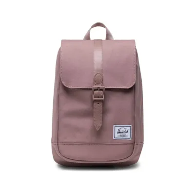 Muted pink Herschel retreat sling bag.
