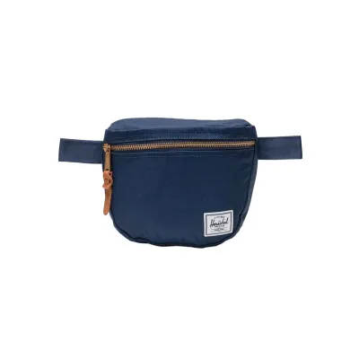 Navy Herschel hip pack with gold zipper.