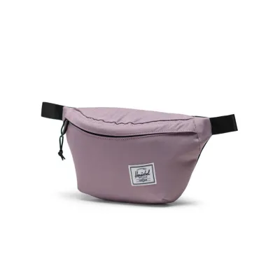 Muted pink Herschel hip pack with black zipper.