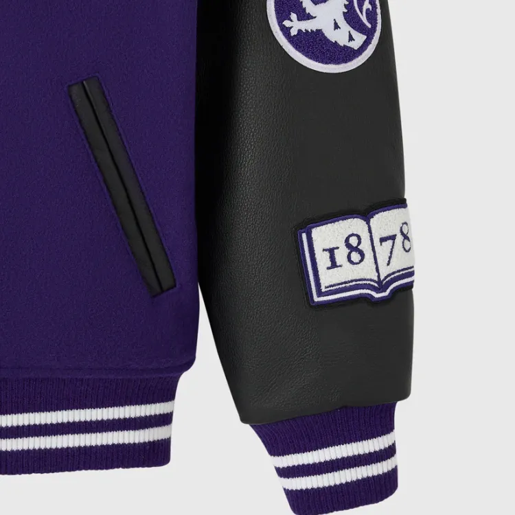 Sleeve detail showing 1878 book logo and Western crest detail patches.