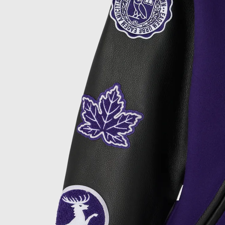 Sleeve detail showing maple leaf, OVO crest and Western crest detail patches.