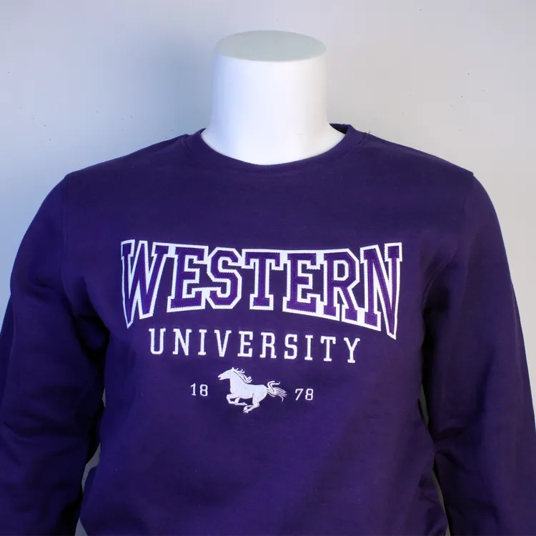 Purple crewneck with Western University 1878 embroidered on the front.