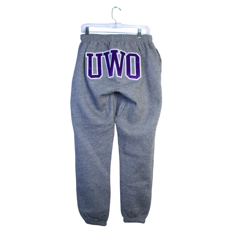 Charcoal grey sweat pants with UWO across the backside.