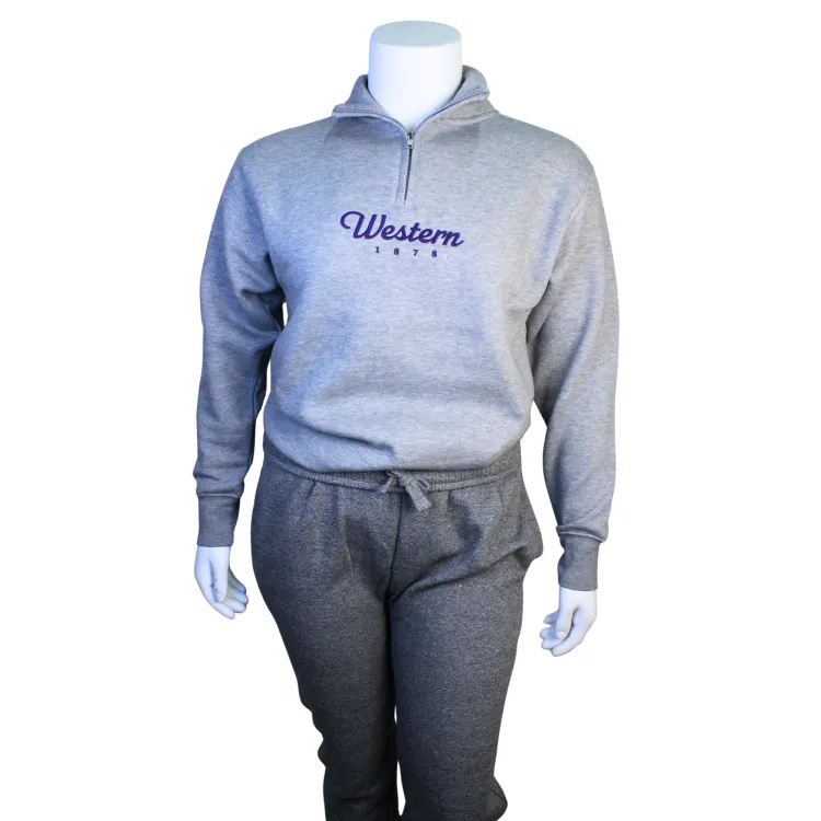 Heather grey 1/4 zip with Western 1878 embroidered in purple on the front of the garment.