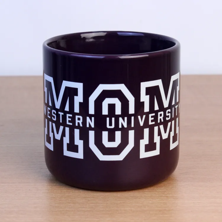 Purple mug with Western University Mom written on the front.