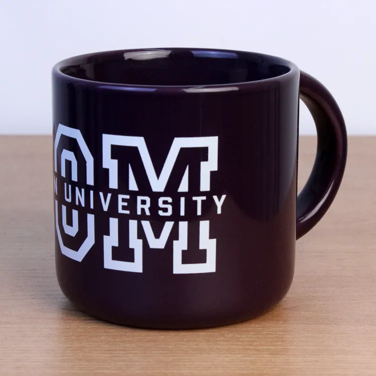 Purple mug with Western University Mom written on the front.