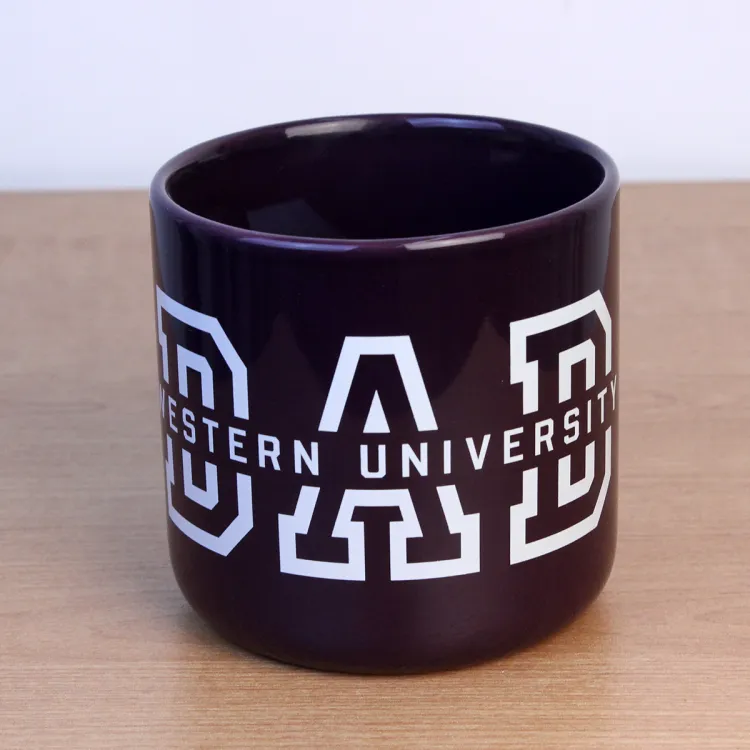 Purple mug with Western University Dad written on the front.
