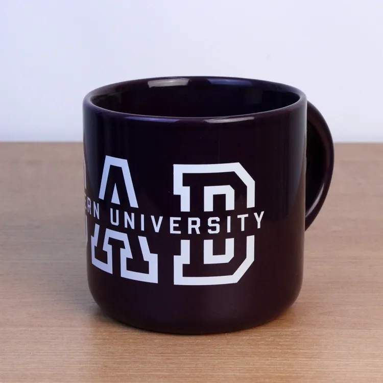 Purple mug with Western University Dad written on the front.