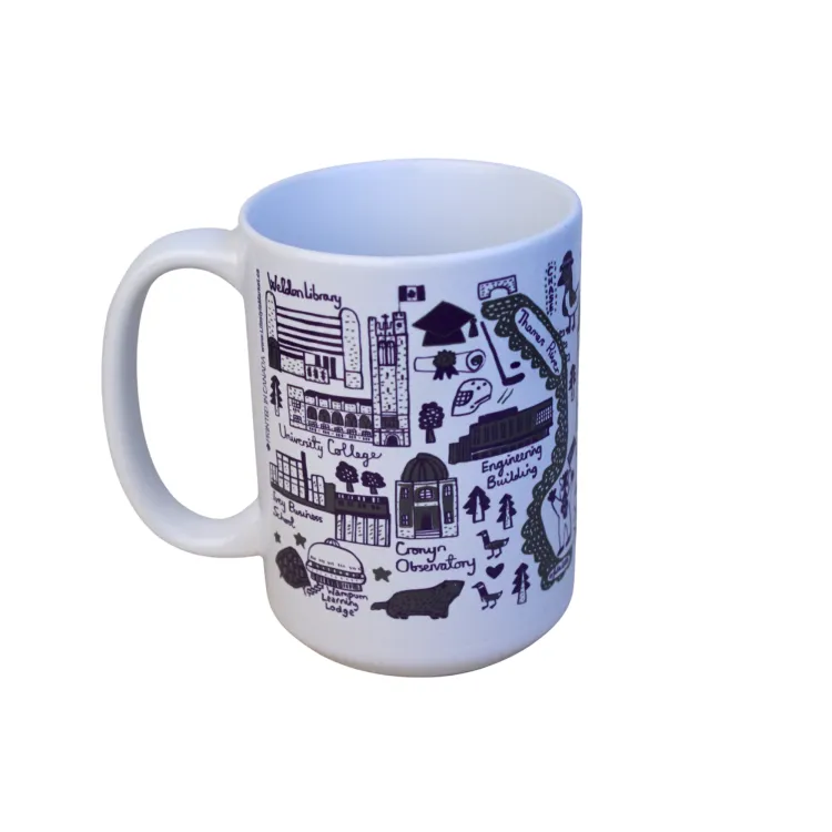 White mug with Julia Gash's Western campus art.