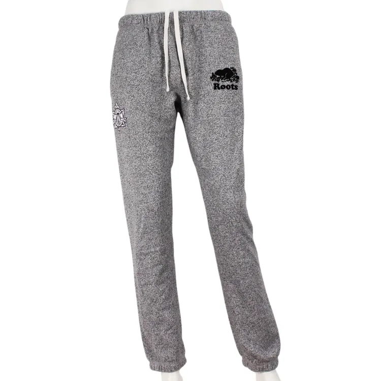 Salt & Pepper Roots sweatpants with front drawstring and pockets. Embroidered western university leaf felt patch on the front of right leg and 'Roots' logo on the front of left leg.