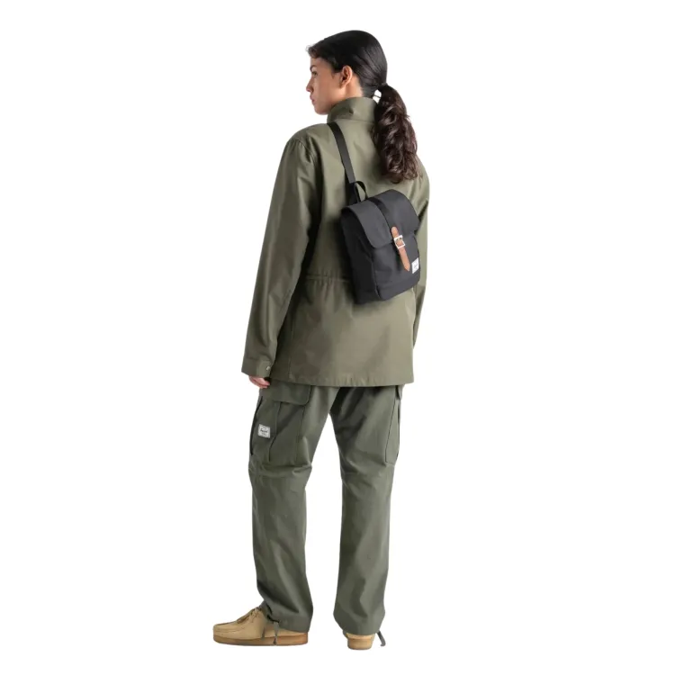Tonal black Herschel retreat sling bag.