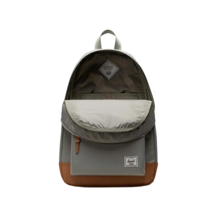 Heritage green grey Herschel backpack with front pocket.