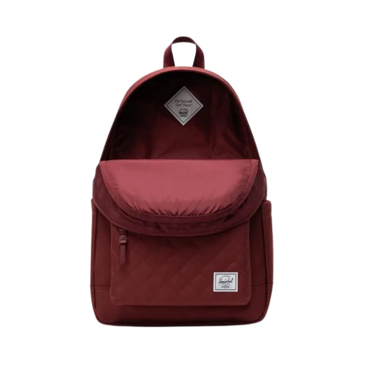 Deep red Hershel backpack with front pocket.