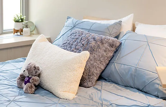 pillows laid neatly on a bed