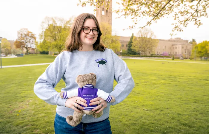 Student Holding a Gift