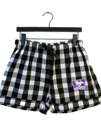 Black and white gingham patterned pajama shorts with a purple and white mustangs logo on the right side.