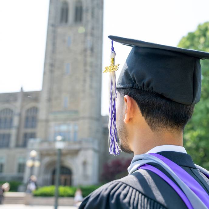 Graduate wearing grad cap with 