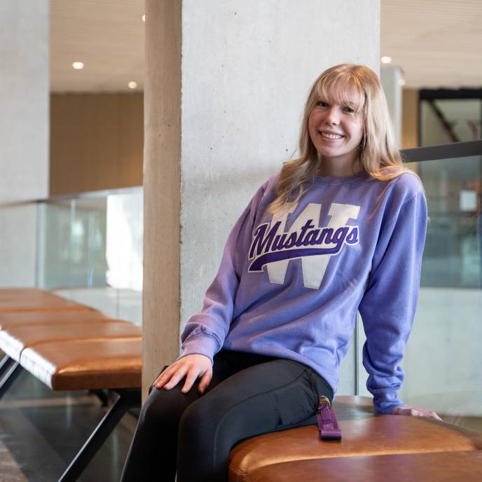 One student wearing Western merch